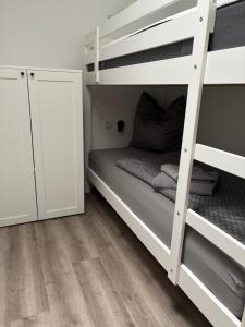 Postel nebo postele na pokoji v ubytování Containerhaus Nordlicht