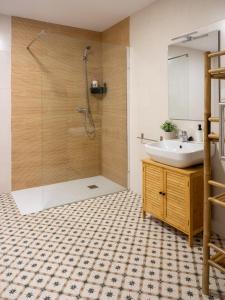 a bathroom with a shower and a sink at Boho Beach Flats in Valencia +63 photos