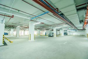 an empty parking garage with cars parked in it at Sakura Residence & Hotel in Yangon