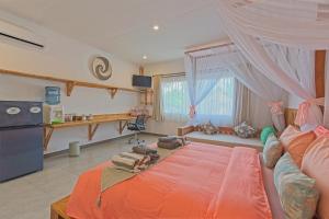 Posteľ alebo postele v izbe v ubytovaní CoCo Breeze Spa Hotel