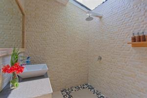 Kúpeľňa v ubytovaní CoCo Breeze Spa Hotel