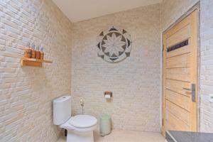 Kúpeľňa v ubytovaní CoCo Breeze Spa Hotel
