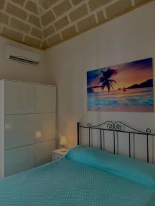 Posteľ alebo postele v izbe v ubytovaní La palma rooms & apartments