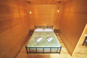 Postel nebo postele na pokoji v ubytování Mountain Cabins