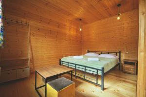 Postel nebo postele na pokoji v ubytování Mountain Cabins