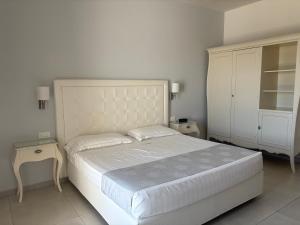 Letto o letti in una camera di Hotel Puglia Garden