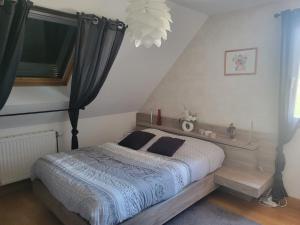 Postel nebo postele na pokoji v ubytování Le jardin + 20 fotografií