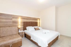 Rúm í herbergi á Apartments Ada Bojana