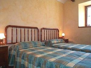 Postel nebo postele na pokoji v ubytování Palacio Lerruz I y Palacio Lerruz II + 31 fotografií