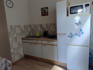 Kuchyňa alebo kuchynka v ubytovaní Hostel Staromiejski