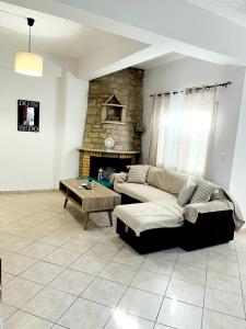 A seating area at "Villa Kanavos" apts