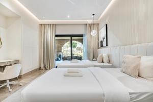 Ein Bett oder Betten in einem Zimmer der Unterkunft DAYF-FMT Fairmont Palm with Pool and Beach Access