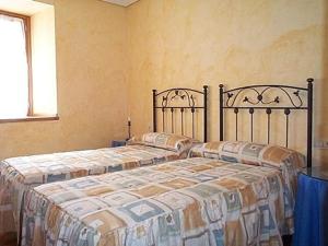 Postel nebo postele na pokoji v ubytování Palacio Lerruz I y Palacio Lerruz II