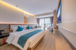 Kunming Meihao Lizhi Hotel Cuihu Park Yunnan University Hospital Branch電視和／或娛樂中心