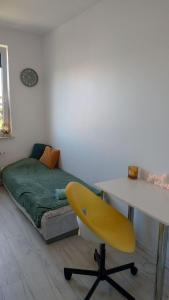 Łóżko lub łóżka w pokoju w obiekcie Sunshine Rooms