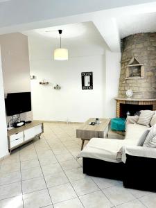 A television and/or entertainment centre at "Villa Kanavos" apts