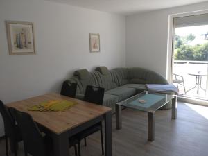 Posezení v ubytování 3 Raum Wohnung
