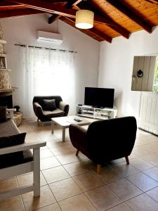 A television and/or entertainment centre at "Villa Kanavos" apts