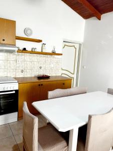 A kitchen or kitchenette at "Villa Kanavos" apts