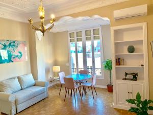 a living room with a couch and a table at Hi Valencia Canovas in Valencia