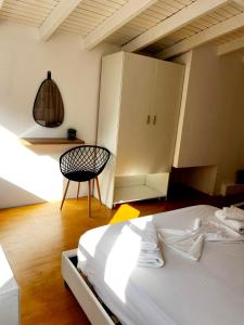 A bed or beds in a room at "Villa Kanavos" apts