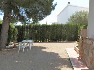 Zahrada ubytování Casa cerca del mar con piscina privada, aire opcional, wifi, admite mascotas y cerca de playa para perros - ES-184-37