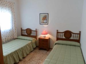 Postel nebo postele na pokoji v ubytování Casa cerca del mar con piscina privada, aire opcional, wifi, admite mascotas y cerca de playa para perros - ES-184-37 + 23 fotografií