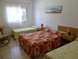 Postel nebo postele na pokoji v ubytování Casa cerca del mar con piscina privada, aire opcional, wifi, admite mascotas y cerca de playa para perros - ES-184-37