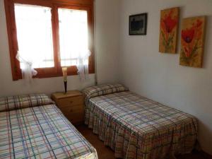 Posteľ alebo postele v izbe v ubytovaní Casa ideal con piscina privada, cerca del mar, wifi gratis, aire opcional, mascotas y playa para perros - ES-184-16 + 27 fotografií