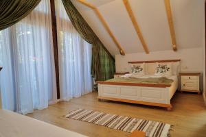 Katil atau katil-katil dalam bilik di Casa Stefania +94 gambar