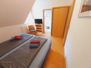 Ένα ή περισσότερα κρεβάτια σε δωμάτιο στο Katrins am Kölpinsee Doppelzimmer