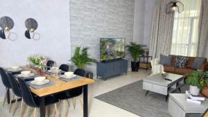 Un lugar para sentarse en Yas Amazon - Stylish 1BR Apartment on Yas Island, Near Yas Mall