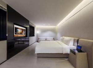 Imagen de la galería de Orange Crystal Qingdao Jimo Ancient City Hotel, en Qingdao