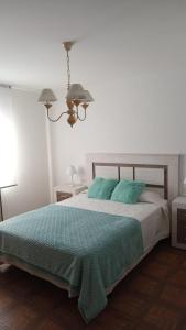 Postel nebo postele na pokoji v ubytování Casa Mabel Vilaxoan