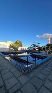 a group of picnic tables on a roof at Hotel Acqua Park in Capim Grosso