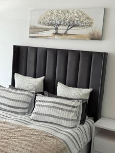 En eller flere senge i et værelse på Windhoek view