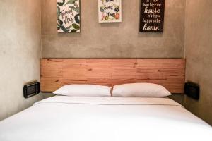 Postel nebo postele na pokoji v ubytování Hotel Summerville