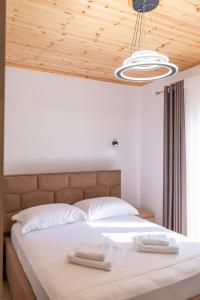 Postel nebo postele na pokoji v ubytování Vila Lukas