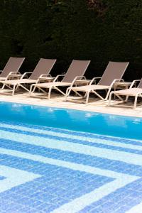 Bazén v ubytování Portaria Hotel nebo v jeho okolí
