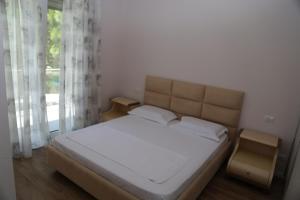 Ένα ή περισσότερα κρεβάτια σε δωμάτιο στο Artino +24 φωτογραφίες