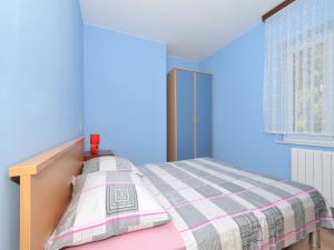 Postel nebo postele na pokoji v ubytování Apartment Vukadin