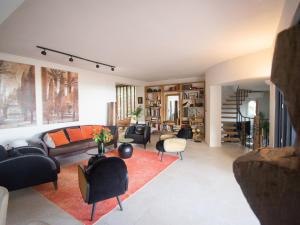 a living room with a couch and chairs at Carqueiranne: Villa de Charme avec Piscine, Vue Mer, pour 8 Personnes - FR-1-599-119 in Carqueiranne