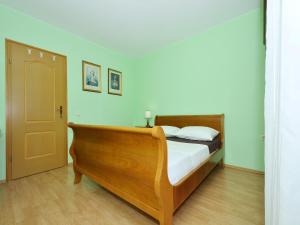 Postel nebo postele na pokoji v ubytování Apartment Vukadin