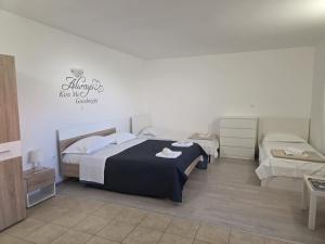 Postel nebo postele na pokoji v ubytování Batkoski Apartments