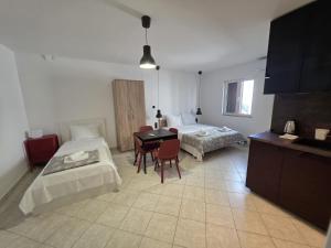 Postel nebo postele na pokoji v ubytování Batkoski Apartments