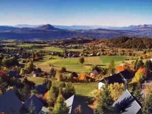 an aerial view of a small village in the mountains at Duplex 6 pers, animaux admis, balcon sud, Chaillol 1600 - FR-1-393-182 in Saint-Michel-de-Chaillol
