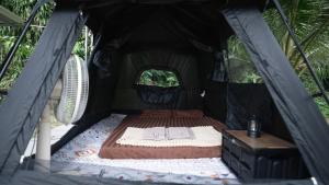 Ένα ή περισσότερα κρεβάτια σε δωμάτιο στο Mellow Camp kohkood +21 φωτογραφίες