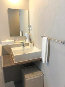 Koupelna v ubytování Hotel Gee Haive