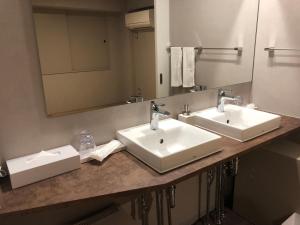 Koupelna v ubytování Hotel Gee Haive