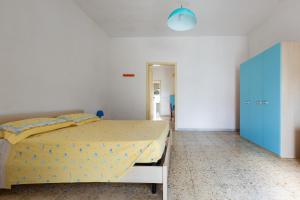 Postel nebo postele na pokoji v ubytování Casina Gigina by BarbarHouse